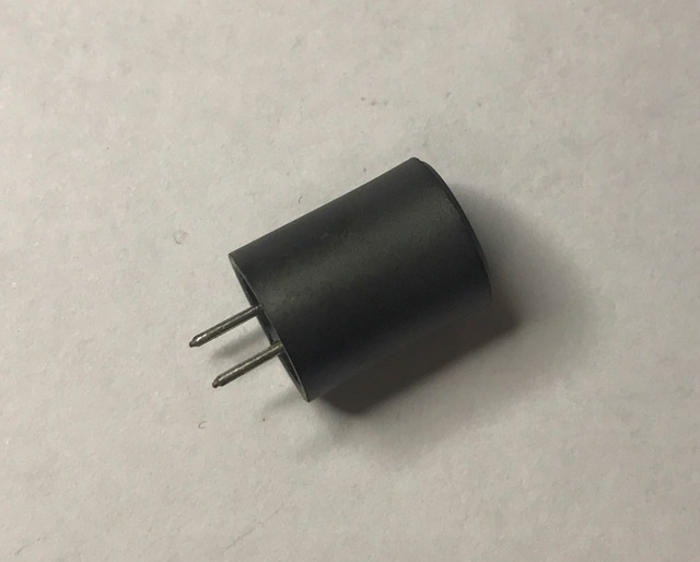 Choke coil radial 56mH barrel gray smooth